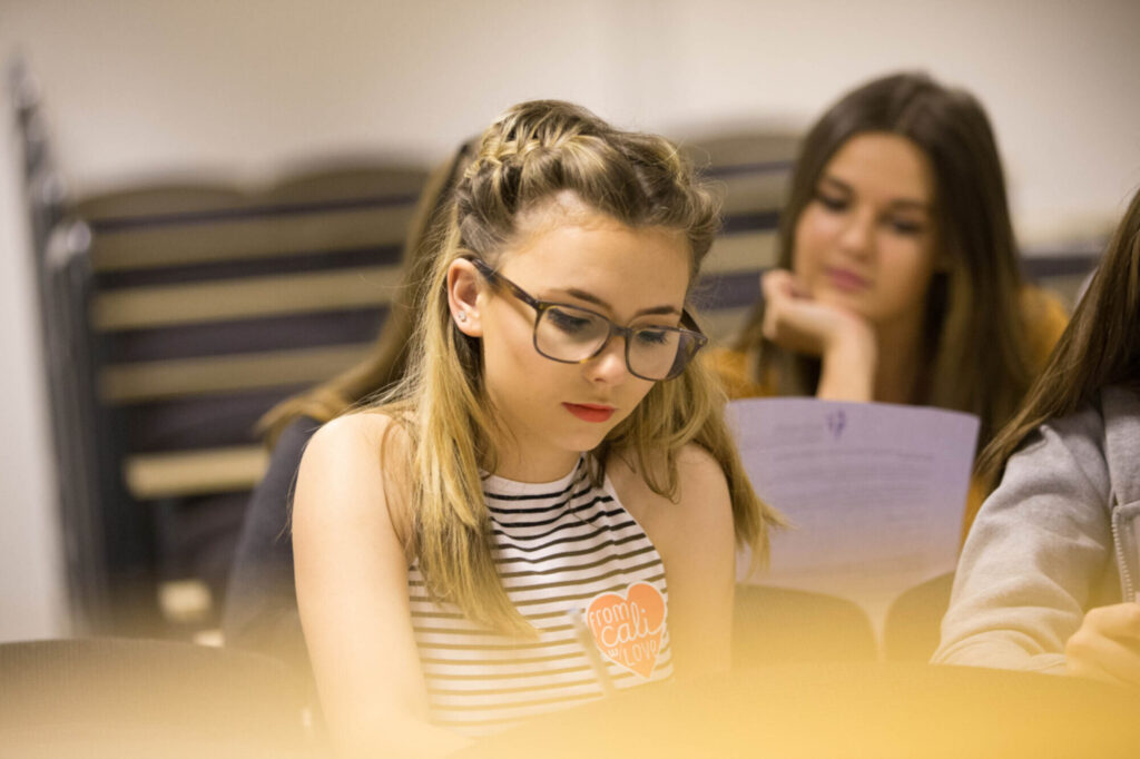 Business A level in Cardiff - Image depicts students learning business a level in St David's Catholic Sixth Form College