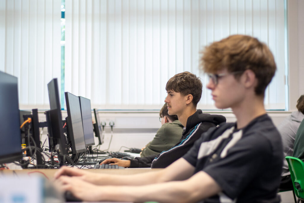 Students at their computers in class