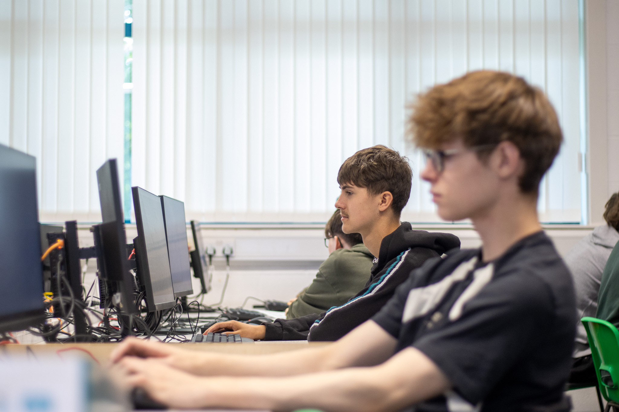 Students at their computers in class