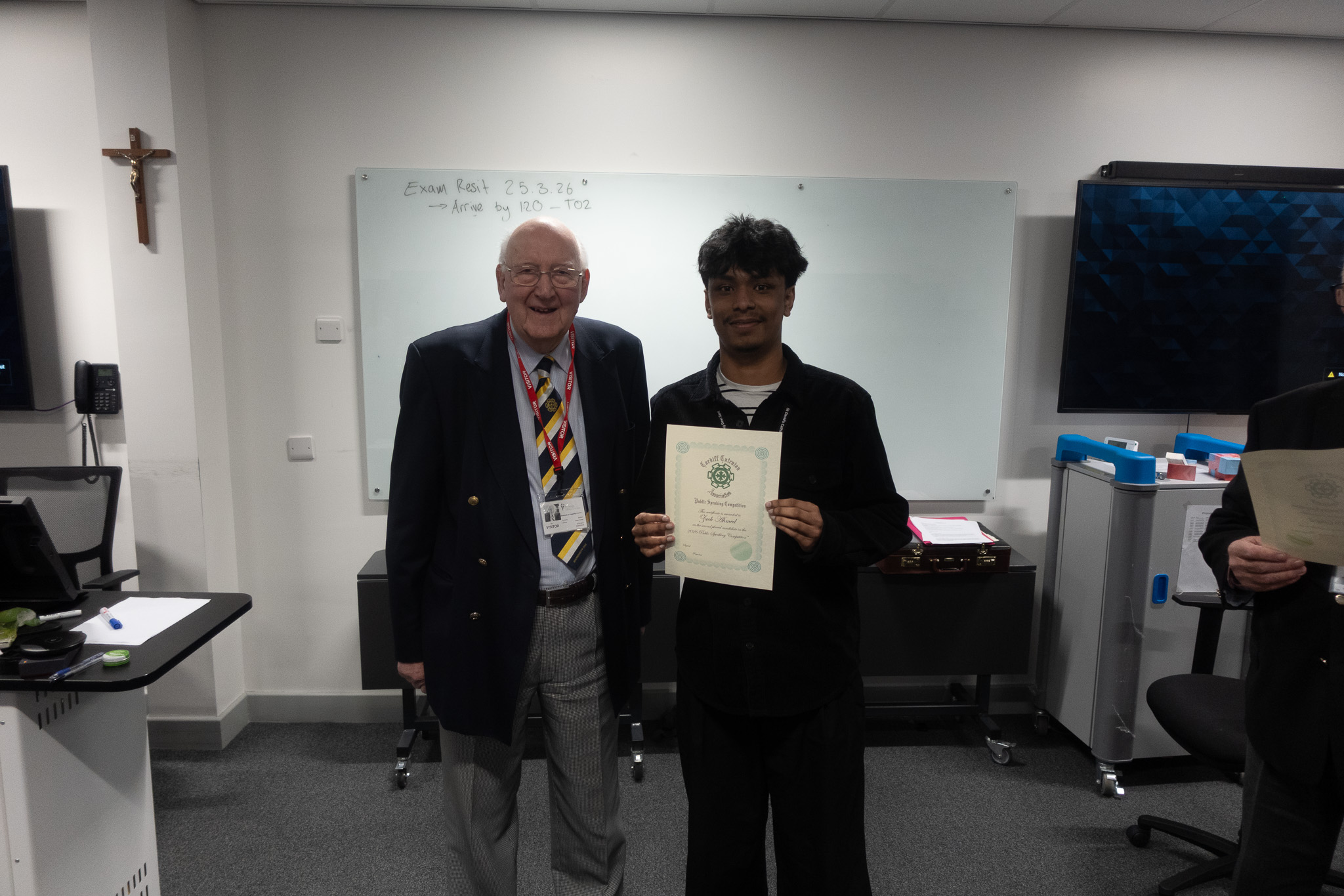 Student with his certificate