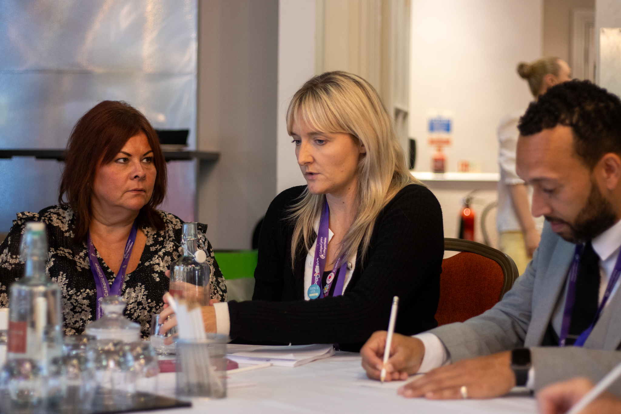 Staff around a table