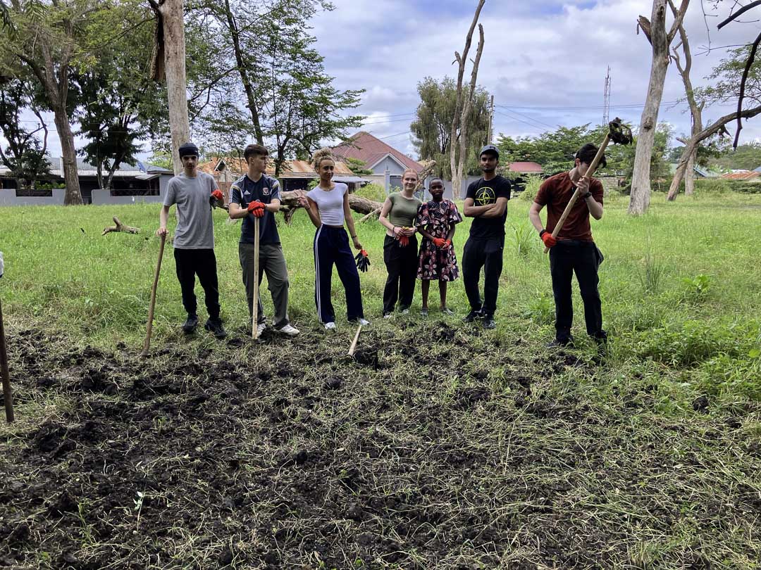 Students planting a garden