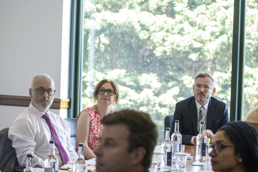 Delegates seated around table at the St David's Symposium For Innovation in Catholic Education