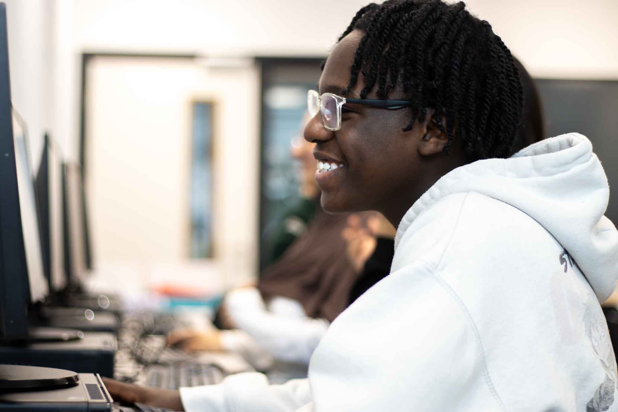 Student at St David's College seeking support and welfare through their computer