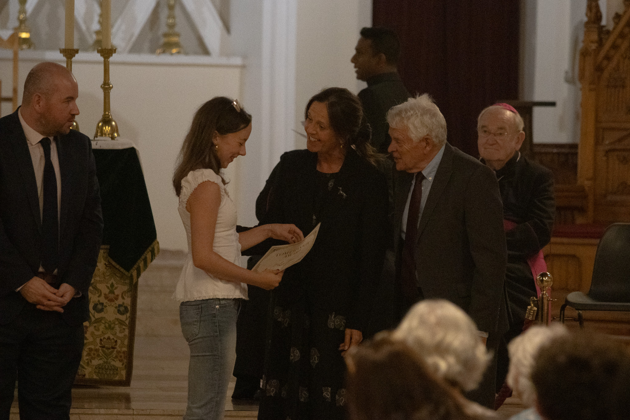 St David's student accepting award at Cardiff Cathedral