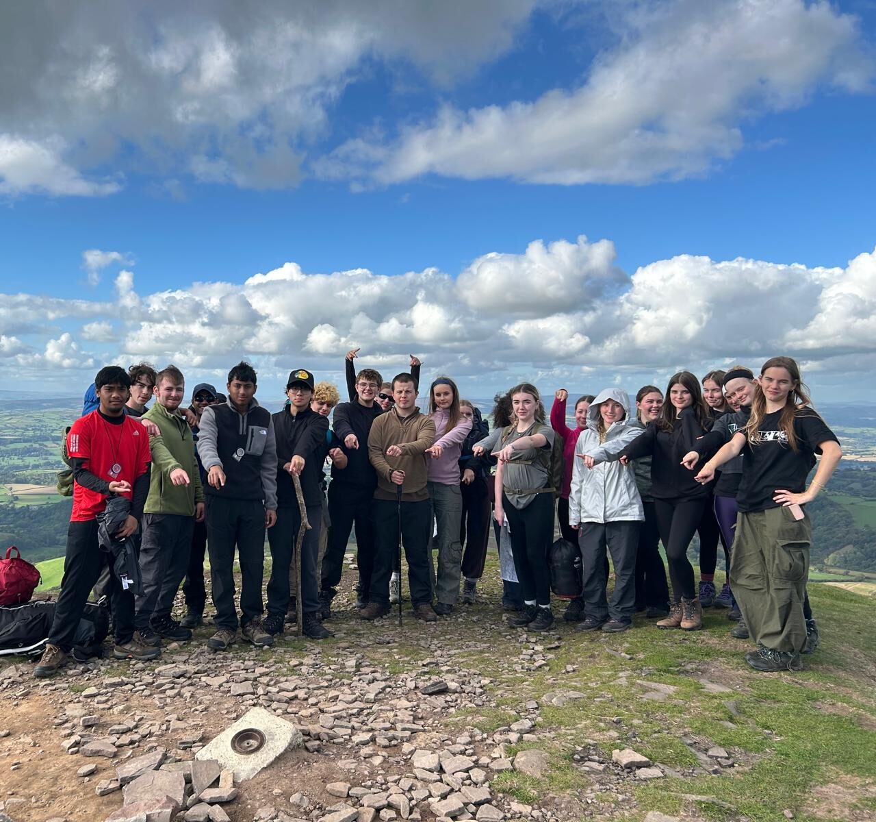 St David's College students posing on Brecon Beacons